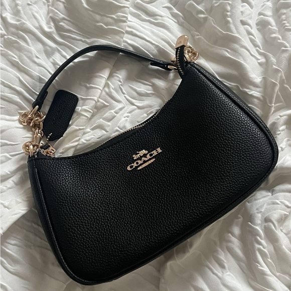 Coach Handbags - Coach Black Leather Shoulder Bag with Gold Accents